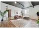 Inviting living room with hardwood floors, trendy furniture, and modern lighting fixtures at 901 Central Dr, Kannapolis, NC 28083