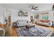 Inviting living room featuring stylish decor, hardwood floors, and lots of natural light at 901 Central Dr, Kannapolis, NC 28083