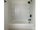 Clean and modern bathroom featuring a white tub with subway tile and black fixtures at 905 Gantt St, Kings Mountain, NC 28086