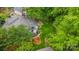 Aerial view of a backyard with a fire pit and landscaping at 9310 Hunting Ct, Matthews, NC 28105