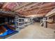 Unfinished basement providing storage and room to make a workshop, with pink insulation and ductwork at 9310 Hunting Ct, Matthews, NC 28105
