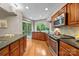 Well-equipped kitchen with modern appliances, granite countertops, and ample cabinet space at 9310 Hunting Ct, Matthews, NC 28105