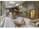 Relaxing sunroom with vaulted ceilings, skylights, and screened walls at 9310 Hunting Ct, Matthews, NC 28105