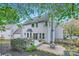 Two-story home with a spacious backyard, wooden fence and deck at 9517 Harris Glen Dr, Charlotte, NC 28269