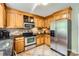 Functional kitchen with stainless steel appliances, ample cabinet space, and a window at 9517 Harris Glen Dr, Charlotte, NC 28269
