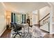 Bright living room with a bay window, hardwood floors, and neutral paint at 9517 Harris Glen Dr, Charlotte, NC 28269