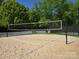 Sandy volleyball court ready for a friendly match in a well-maintained outdoor area at 9517 Harris Glen Dr, Charlotte, NC 28269