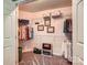 Walk-in closet offers ample storage with shelving and clothing rods on all sides at 9517 Harris Glen Dr, Charlotte, NC 28269