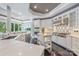 Gourmet kitchen featuring a gas cooktop, stainless appliances, and a beautiful view at 102 Eastham Ct, Mooresville, NC 28117