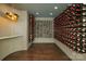 Spacious wine cellar with extensive bottle storage and wood floors at 102 Eastham Ct, Mooresville, NC 28117