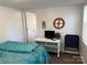 Comfortable bedroom with furniture, including a dresser, television, and a nautical theme at 104 Powder Horn Trl # C92, Mount Gilead, NC 27306