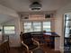 Bright room with built in shelving, a dedicated workspace, and natural light from multiple windows at 104 Powder Horn Trl # C92, Mount Gilead, NC 27306