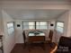 Cozy room with a drop leaf dining table and chairs, plus natural light from multiple windows at 104 Powder Horn Trl # C92, Mount Gilead, NC 27306