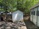 Storage shed providing ample space for gardening tools and equipment, conveniently located near the home at 104 Powder Horn Trl # C92, Mount Gilead, NC 27306