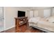 Comfortable main bedroom offering hardwood floors, ample closet space, and room for a media console at 1043 Nancy Dr, Charlotte, NC 28211