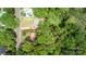 Expansive aerial view showcases the property's generous lot size and surrounding lush greenery, providing privacy and space at 10708 Danesway Ln, Cornelius, NC 28031