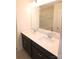 Bathroom with a double vanity featuring white countertops and dark wood cabinets at 1075 South Point Rd, Belmont, NC 28012