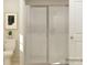 Bathroom featuring a clear glass shower, toilet, and wall art at 1094 Old Trade St, Edgemoor, SC 29712