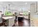 Spacious kitchen features a central island, stainless steel appliances, and modern lighting at 11 Secrest Ext, Belmont, NC 28012