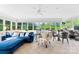 Bright living room featuring large windows, comfortable seating, and inviting natural light at 11 Secrest Ext, Belmont, NC 28012