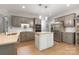 Modern kitchen with stainless steel appliances, a center island, and stylish cabinets at 110 River Wood Dr, Fort Mill, SC 29715