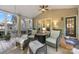 Inviting screened-in porch with comfortable seating and ceiling fan provides an ideal outdoor retreat at 110 River Wood Dr, Fort Mill, SC 29715