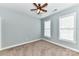 Bright bedroom featuring carpeted floor and two windows for ample natural light at 11123 Bailey Park Nature Dr, Cornelius, NC 28031