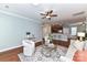 Open living room and kitchen with a breakfast bar at 11123 Bailey Park Nature Dr, Cornelius, NC 28031