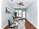 Cozy sitting area bathed in natural light, featuring hardwood floors and stylish decor at 11123 Bailey Park Nature Dr, Cornelius, NC 28031