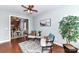 Comfortable seating area with open access to the dining and kitchen areas at 11123 Bailey Park Nature Dr, Cornelius, NC 28031