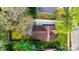 Overhead property shot, features a backyard, driveway, mature trees, and neighboring houses at 112 Circle Dr, Salisbury, NC 28144