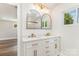 Bright bathroom with double vanity, marble countertops, and gold fixtures offering a modern aesthetic at 112 Circle Dr, Salisbury, NC 28144