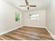 Bedroom featuring hardwood floors, neutral paint, and a ceiling fan for added comfort and style at 112 Circle Dr, Salisbury, NC 28144