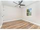 Bright bedroom featuring hardwood floors, neutral paint, a ceiling fan, and a window providing natural light at 112 Circle Dr, Salisbury, NC 28144