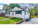Lovely brick home with charming facade, welcoming front porch, and manicured lawn at 112 Circle Dr, Salisbury, NC 28144
