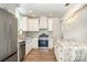 Modern kitchen with stainless steel appliances and center island at 112 Circle Dr, Salisbury, NC 28144