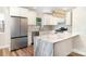 Modern kitchen with stainless steel appliances, island and granite countertops and a stylish light fixture at 112 Circle Dr, Salisbury, NC 28144