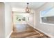 Bright living room boasts hardwood floors and views of the surrounding neighborhood at 112 Circle Dr, Salisbury, NC 28144