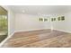 Spacious living room featuring hardwood floors, neutral paint, recessed lighting, and multiple windows for ample natural light at 112 Circle Dr, Salisbury, NC 28144