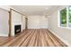 Inviting living room featuring hardwood floors, a cozy fireplace and ample natural light at 112 Circle Dr, Salisbury, NC 28144