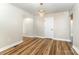 Inviting room featuring sleek hardwood floors and a stylish chandelier at 112 Circle Dr, Salisbury, NC 28144