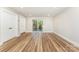 Bright room with hardwood floors and sliding glass doors at 112 Circle Dr, Salisbury, NC 28144