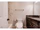 Bathroom featuring modern fixtures, including a toilet with a bidet, marble countertops, and stylish accents at 113 Princess Ln, Dallas, NC 28034