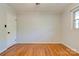 Bedroom featuring hardwood floors, neutral walls, and one window at 113 Princess Ln, Dallas, NC 28034
