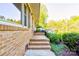 Brick stairs leading to the front entrance with well-maintained landscaping at 113 Princess Ln, Dallas, NC 28034