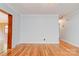Bright and airy living room featuring hardwood floors, neutral paint, and classic trim, ready for personal touches at 113 Princess Ln, Dallas, NC 28034