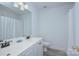 Clean bathroom featuring double sinks, a large mirror, and a shower with curtain at 1202 Foxfield Rd, Waxhaw, NC 28173