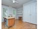 Bright bedroom with hardwood floors, neutral paint, and lots of natural light at 1202 Foxfield Rd, Waxhaw, NC 28173