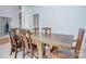 Spacious dining room with rustic wooden table and seating for Gathering gatherings at 1202 Foxfield Rd, Waxhaw, NC 28173