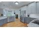 Open kitchen featuring granite countertops, stainless steel appliances, and light and dark cabinetry at 1202 Foxfield Rd, Waxhaw, NC 28173